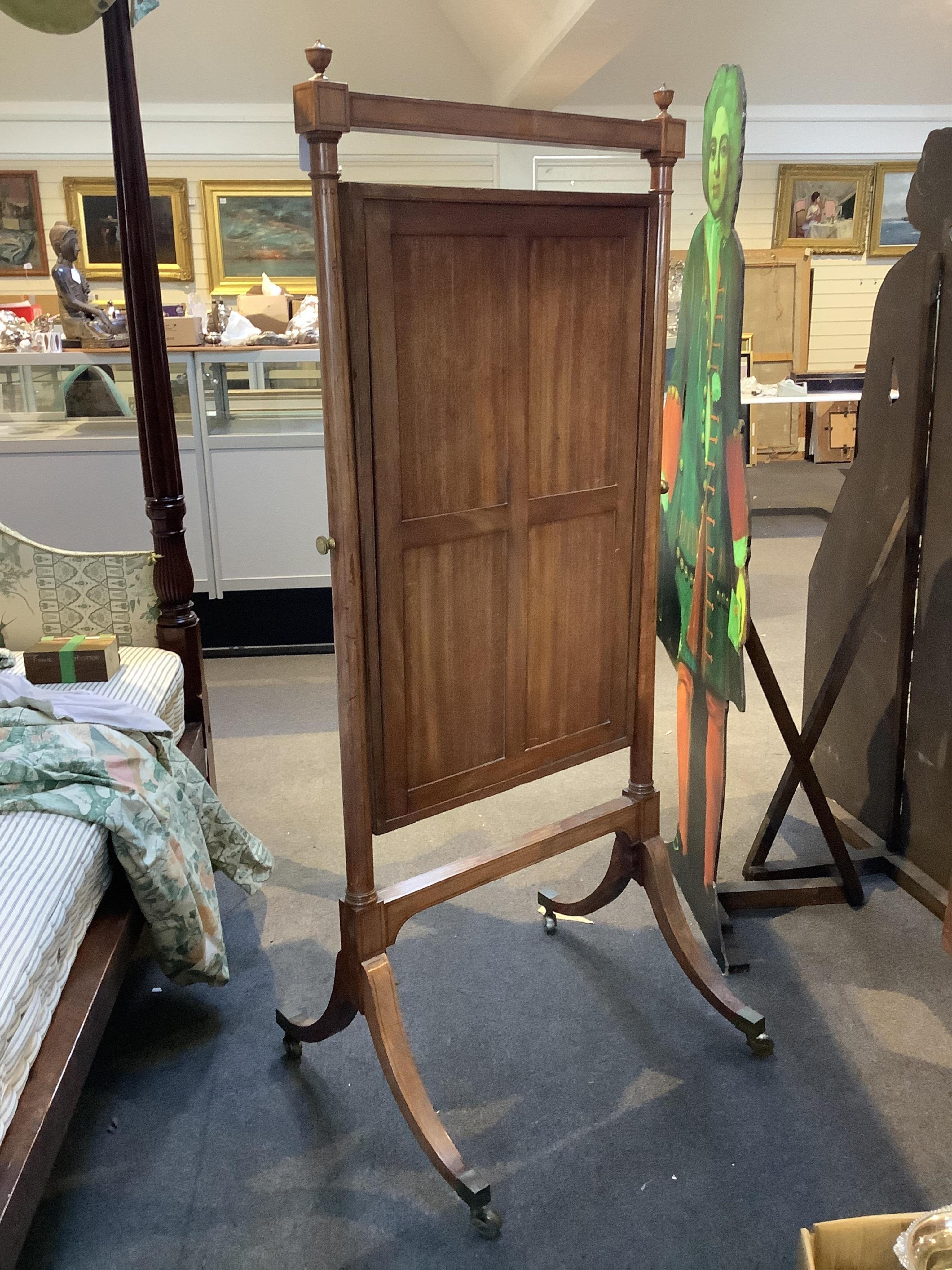 A Regency inlaid mahogany cheval mirror